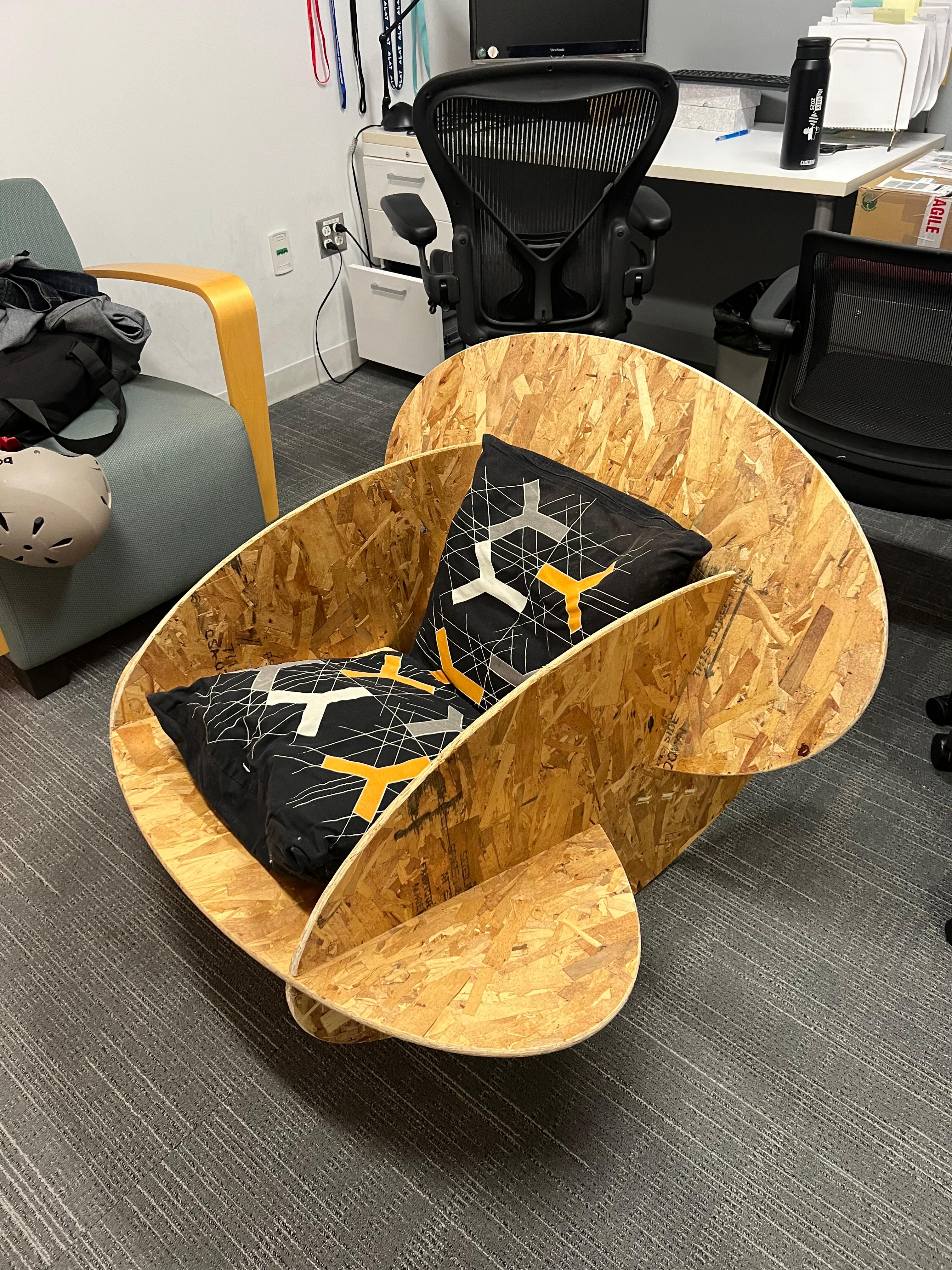 Finished rocking chair with pillows placed for comfort